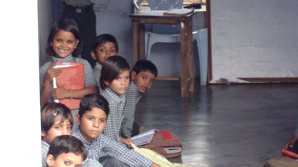 Kids at Haveli School in Rajasthan, India smiling for our cameras