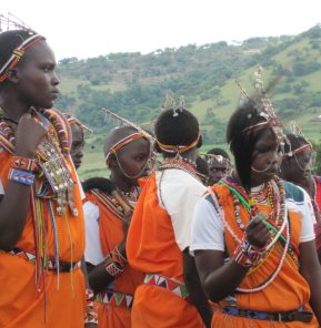 Masai girls in Enoosaen preparing to celebrate the arrival of their new solar lights
